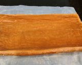 A picture of step 25 of Fresh Rasberry Cake Roll with Whipped White Chocolate Ganache Filling and Frosting.