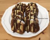 A picture of step 4 of Marble Ricotta Cake.