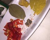 A picture of step 1 of Fish peepered soup garnish with parsely.