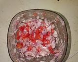 A picture of step 1 of Onion Jowar Atta Pakoda.