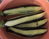 A picture of step 1 of Karnıyarık (Eggplants Stuffed with Ground Meat Sauce).