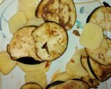 A picture of step 1 of Crispy brinjal and potato pakora.