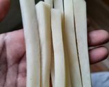 A picture of step 3 of Peri peri fries.