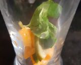 A picture of step 2 of Citrus Curaçao Punch.