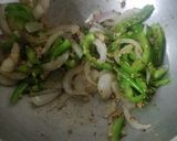 A picture of step 4 of Honey chilli garlic potatoes.