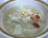 A picture of step 4 of Coconut chicken pot.
