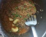 A picture of step 2 of Mutton mince with potato green peas.