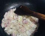 A picture of step 1 of Alu matar gaajar.