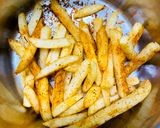 A picture of step 7 of Peri peri fries.