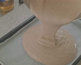 A picture of step 6 of Cocoa Swiss Roll with Chocolate Cream.