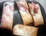 A picture of step 11 of Cherry Cream Crescent Log.