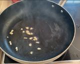 Foto del paso 3 de la receta Arroz con butifarra y puntas de jamón