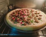 A picture of step 4 of Tikka n kabab pizza.