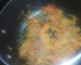 A picture of step 4 of Fried njahi (black beans).