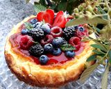 Foto del passaggio 14 della ricetta New York cheesecake con frutti di bosco e coulis di fragole