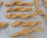 A picture of step 3 of Moong dal Twisties.