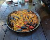 A picture of step 10 of Wood-Fired Seafood and Monkfish Paella.