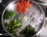 A picture of step 1 of Shakshuka with warm garlic bread (poached eggs in spicy sauces).