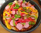 A picture of step 12 of Pepperoncini,bell pepper,easy peel sausage in boboli pizza crust.