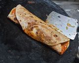 A picture of step 5 of Brocolli wrap.