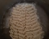 A picture of step 1 of Pizza paneer tikka with Maggie noodle base.