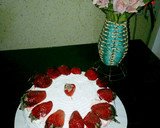 A picture of step 4 of Whipped cream frosting with strawberry.