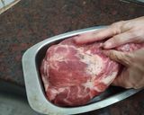 A picture of step 1 of Pork Shoulder with Mustard, Spiced Plums, and Orange Sweet Potato Mash.