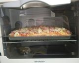 Foto langkah ke 6 dari resep Pizza super empuk! (tahan hingga 24 jam).