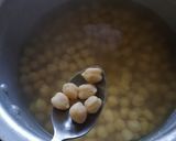 A picture of step 3 of -potato and chickpea roast.