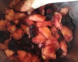 A picture of step 2 of Blackberry & Apple Custard Crumble Tarts.