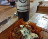 Foto del paso 4 de la receta: Nido de papas fritas relleno con cerdo a la barbacoa