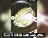 A picture of step 1 of Cheesy & creamy white sauce pasta🍜.