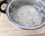 Foto del paso 3 de la receta: Chipirones en su tinta con arroz