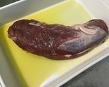 A picture of step 4 of Oven-Roasted Pork Tenderloin with Pink Garlic, Red Onion, and Rosemary.