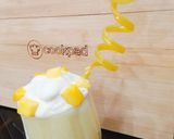 A picture of step 4 of Mango 🥭 shake with ice-cream.