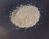 A picture of step 1 of Broken Wheat Kheer with pumpkin seeds.