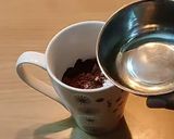A picture of step 6 of Eggless mug brownie.