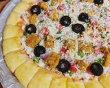 A picture of step 4 of Cheesy Bites Tikka Pizza 🍕🍕.