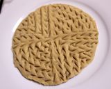 A picture of step 11 of Baked / Fried Khoba Roti.