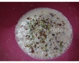A picture of step 2 of Orange Kulfi in orange shell.