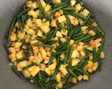 A picture of step 2 of Tortilla with Potatoes and Green Beans.