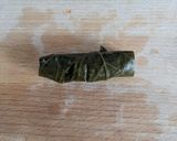 A picture of step 7 of Stuffed vine leave rolls.