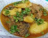A picture of step 7 of Gosht aloo.