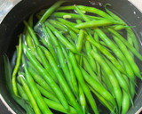 A picture of step 1 of Sesame paste with string beans.