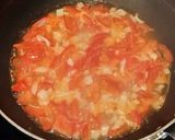 A picture of step 3 of Brad's chicken sausage pasta w/ tomato, basil, vodka cream sauce.