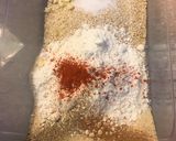 Foto del paso 1 de la receta Pollo empanado con ajo y rúcula
