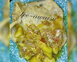 A picture of step 10 of Gurasar larabawa with potatoes and cabbage sauce.