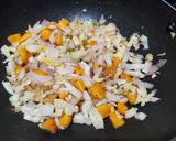 A picture of step 3 of Thai style fried rice with vegetables and tofu.
