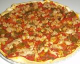Foto del paso 14 de la receta Coca de masa brisa con tomate, pimiento y atún