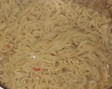 A picture of step 2 of Noddles veggies with chicken.